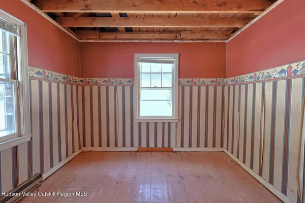 a room with lots of wooden walls