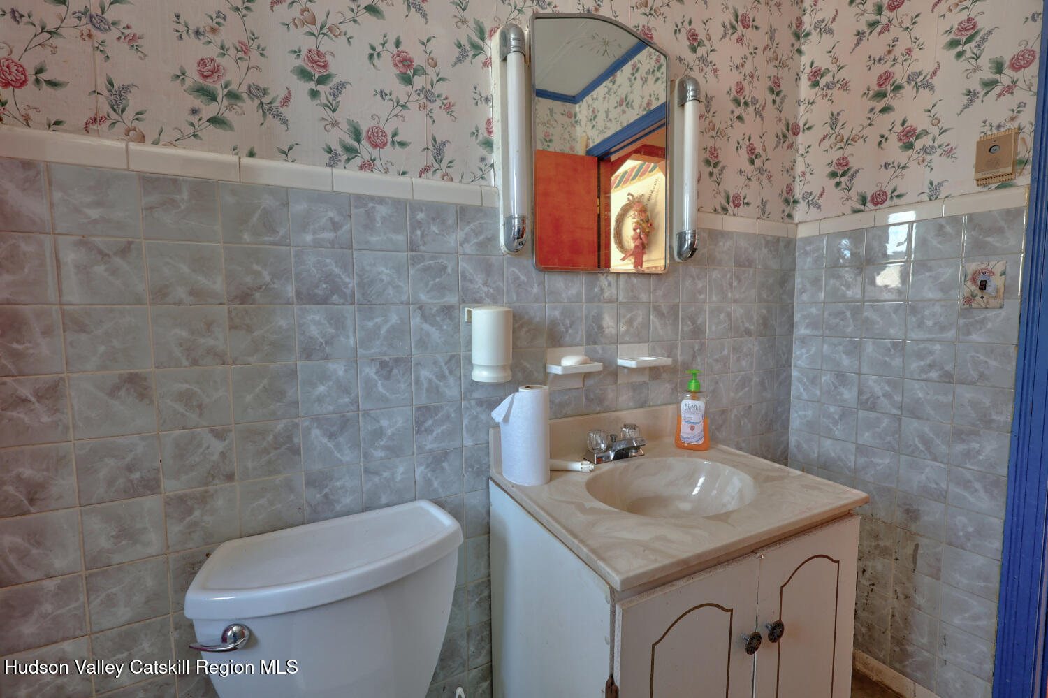 42 Old Rte 23 Cairo, NY 12413 - Photo 40 of 69 a bathroom with a toilet sink and mirror