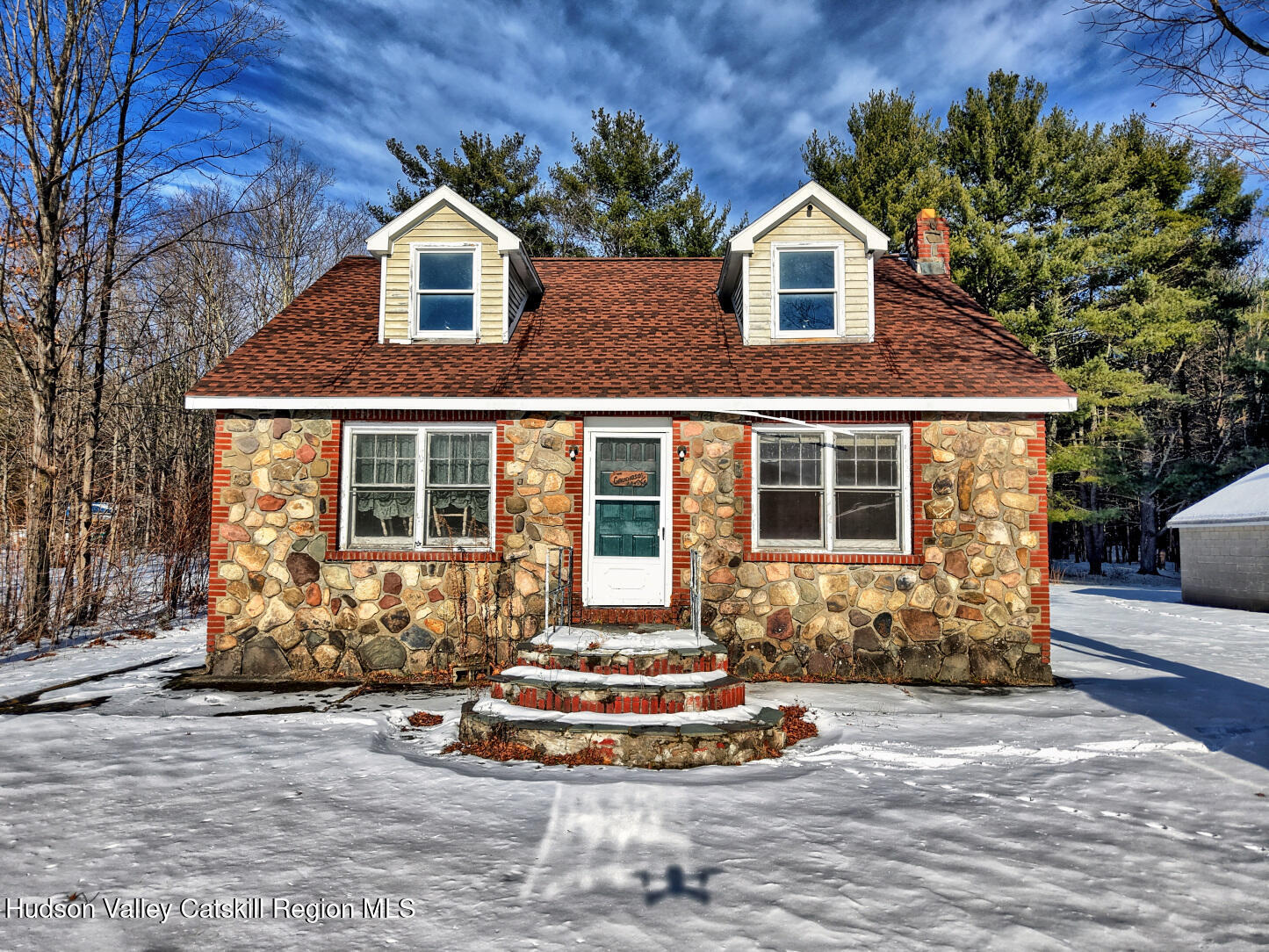 42 Old Rte 23 Cairo, NY 12413 - Photo 5 of 69 a front view of a house with a yard