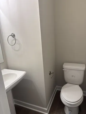 a bathroom with a toilet and a sink