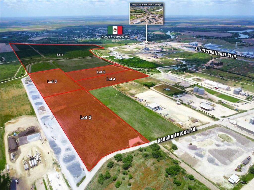 3 Rancho Toluca Road Weslaco, TX 78596 - Photo 2 of 6 a view of swimming pool with a yard