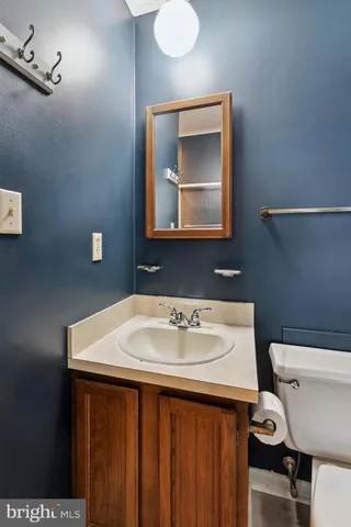 a bedroom with double bed and a window