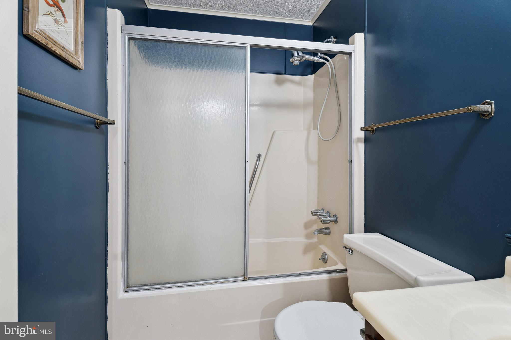 120 53rd Street, Unit H30102 Ocean City, MD 21842 - Photo 35 of 53 a bathroom with a shower and bathtub