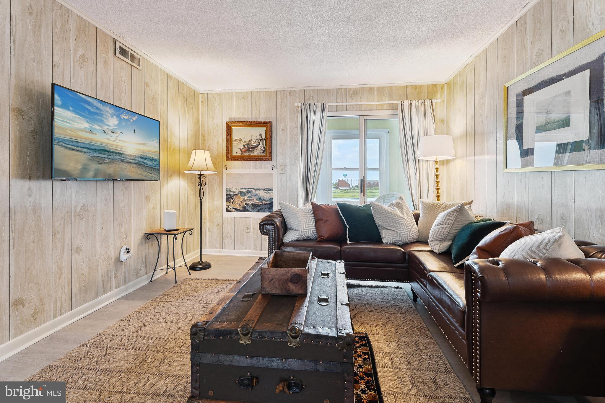 120 53rd Street, Unit H30102 Ocean City, MD 21842 - Photo 4 of 53 a living room with furniture