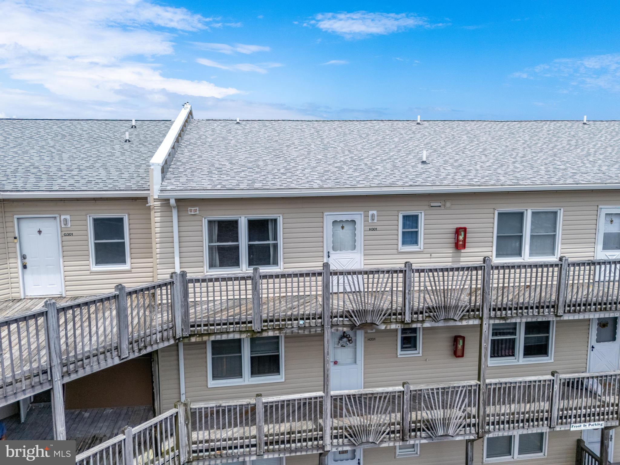 120 53rd Street, Unit H30102 Ocean City, MD 21842 - Photo 49 of 53 a front view of a house with a balcony