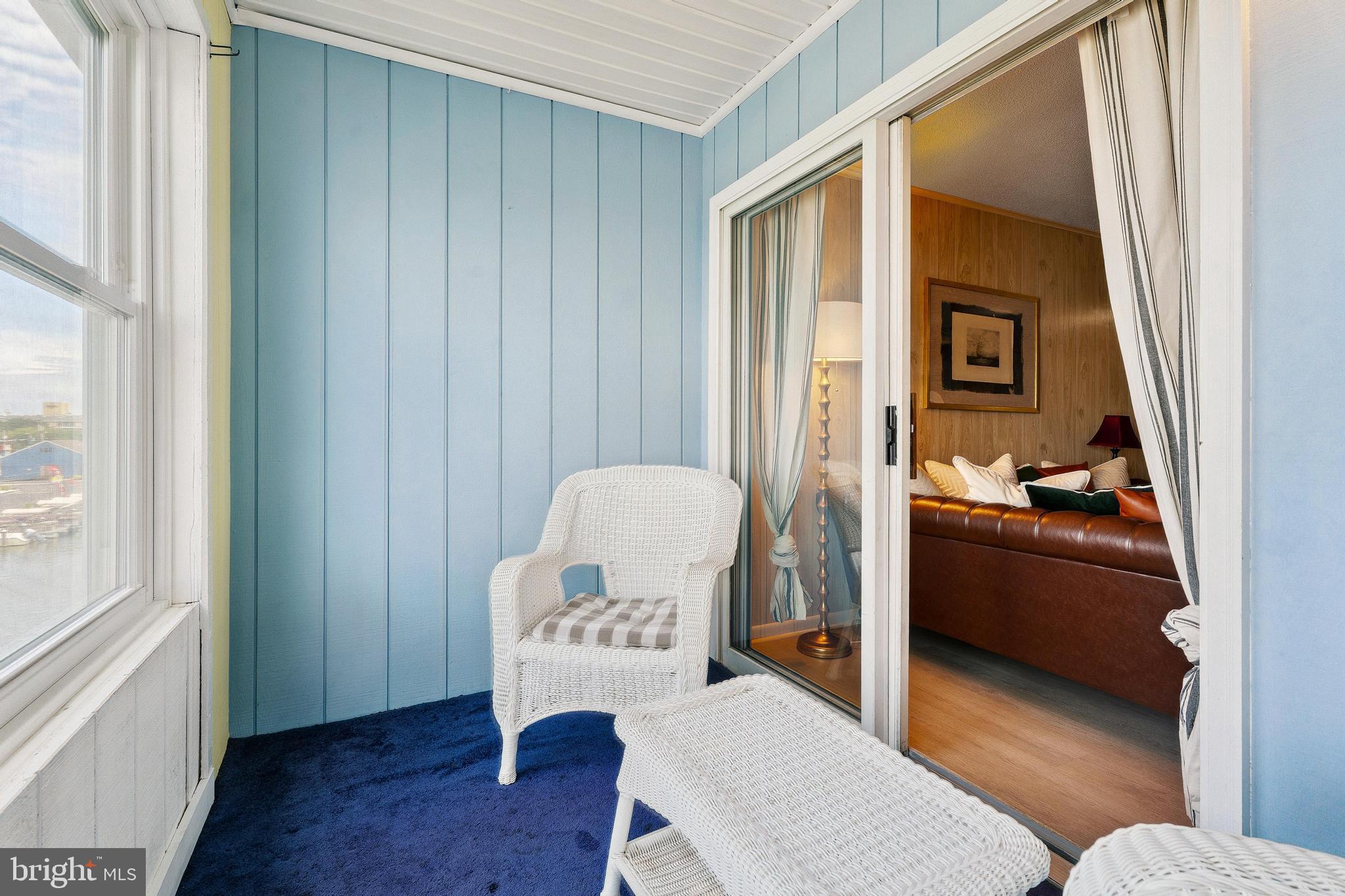 120 53rd Street, Unit H30102 Ocean City, MD 21842 - Photo 9 of 53 a living room with furniture and a window