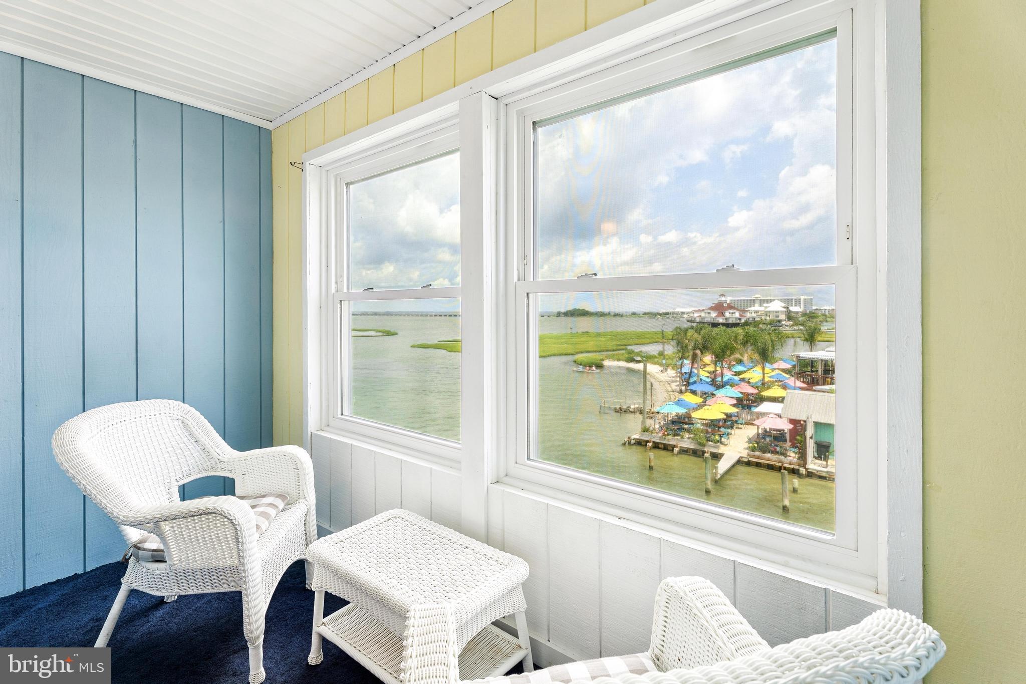 120 53rd Street, Unit H30102 Ocean City, MD 21842 - Photo 10 of 53 a view of a dining room with furniture wooden floor and a potted plant