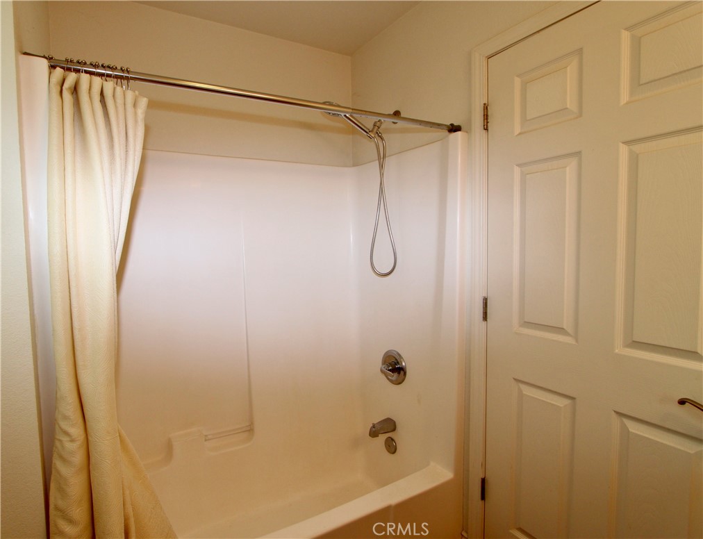 3085 Gardner Road Nice, CA 95464 - Photo 13 of 25 a bathroom with a shower and a glass door