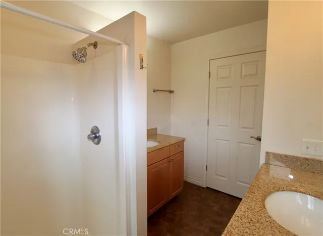 a bathroom that has a sink and a mirror