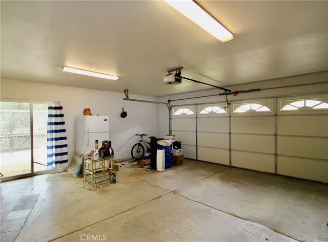 a view of a garage with furniture