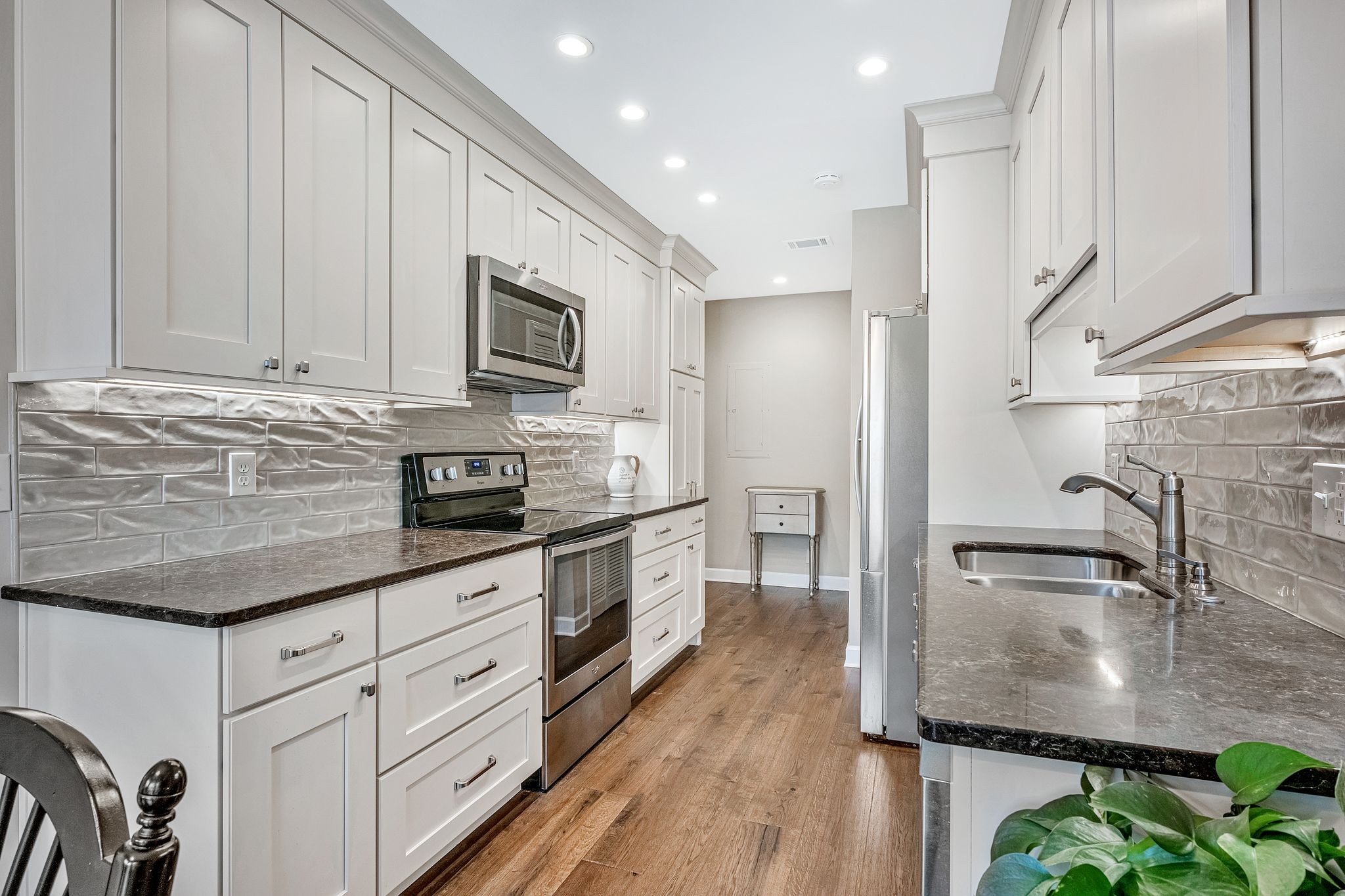 529 General George Patton Road Nashville, TN 37221 - Photo 1 of 28 a kitchen with granite countertop a sink stainless steel appliances and cabinets