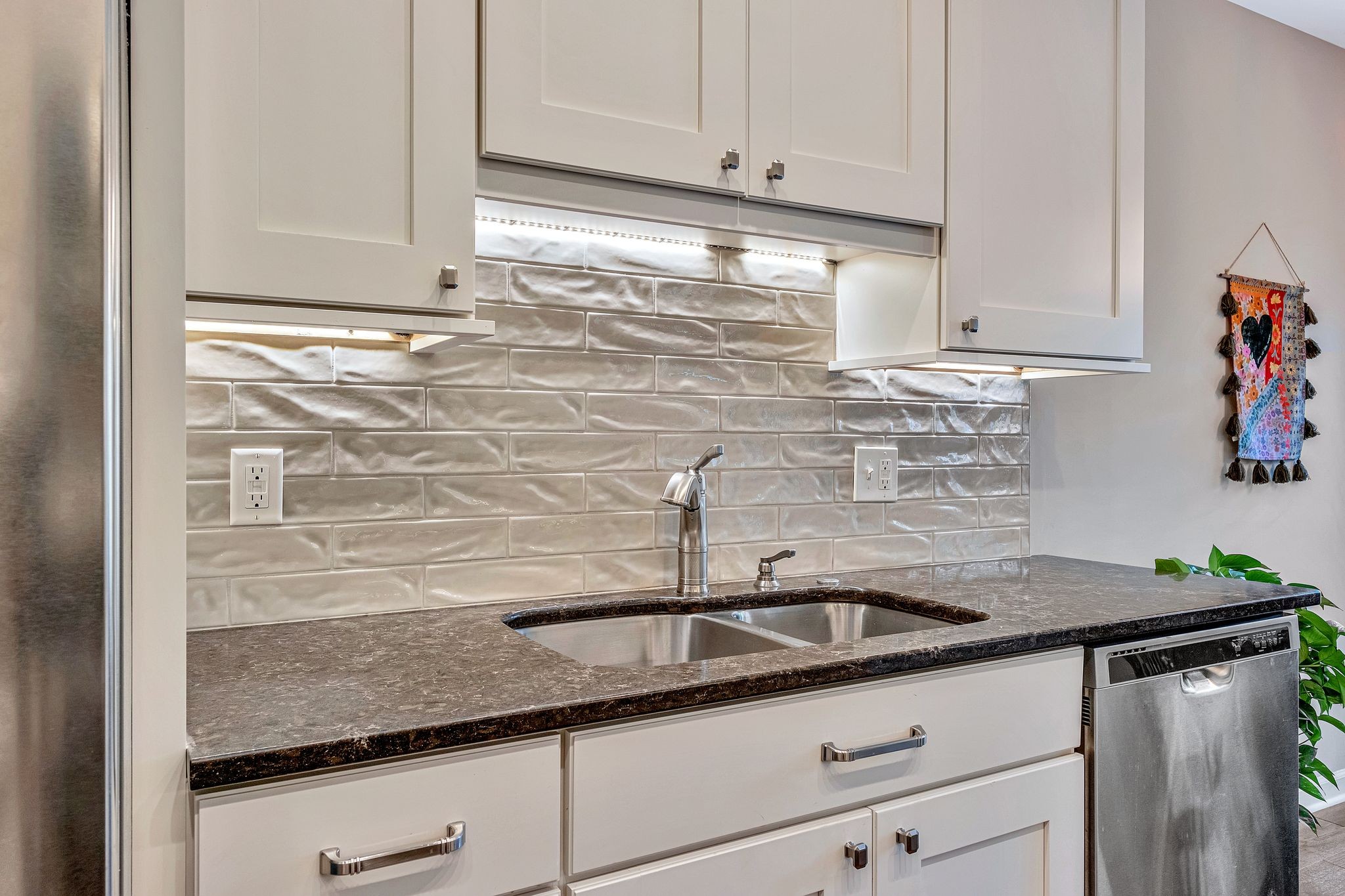 529 General George Patton Road Nashville, TN 37221 - Photo 11 of 28 a kitchen with granite countertop a sink and cabinets