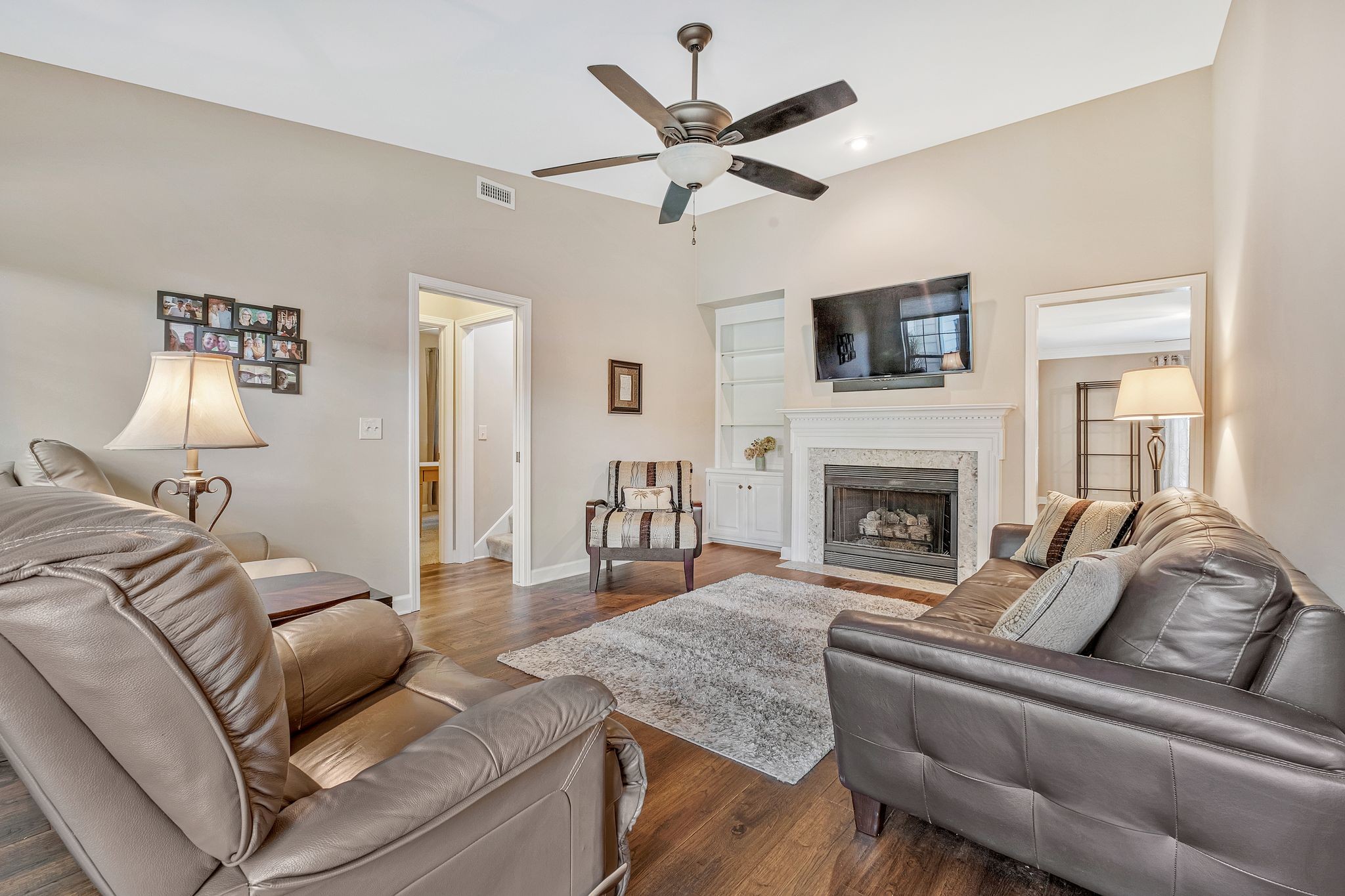 529 General George Patton Road Nashville, TN 37221 - Photo 14 of 28 a living room with furniture and a fireplace