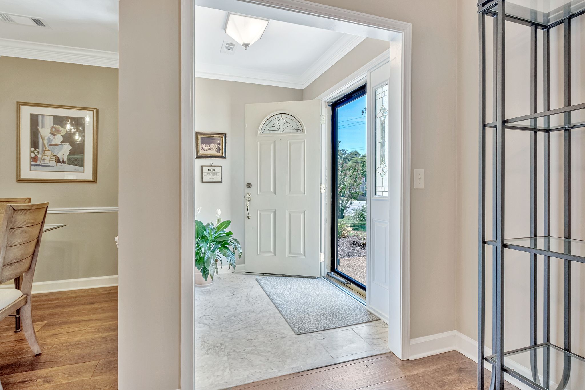 529 General George Patton Road Nashville, TN 37221 - Photo 5 of 28 a view of a hallway with wooden floor and glass door