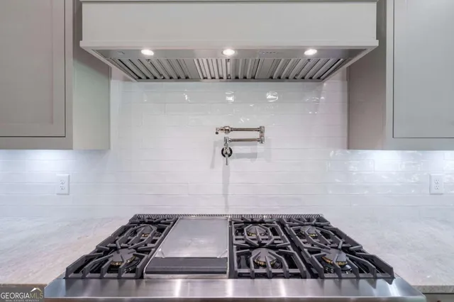 a view of a yard with large trees