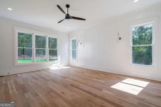 a room with a bed and a window