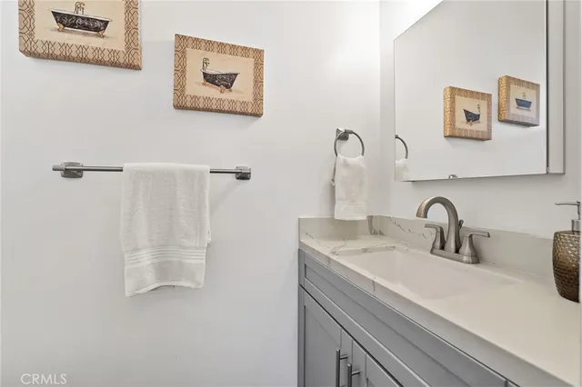 a bedroom with two beds and a large window