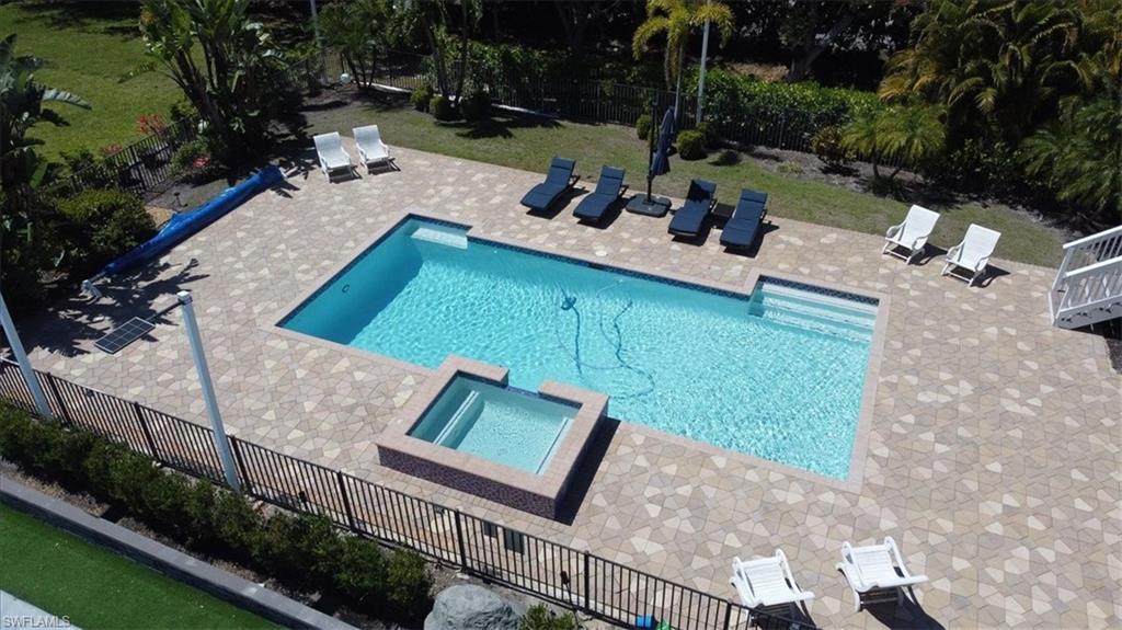 6941 Hunters Road Naples, FL 34109 - Photo 26 of 48 a view of yard from deck