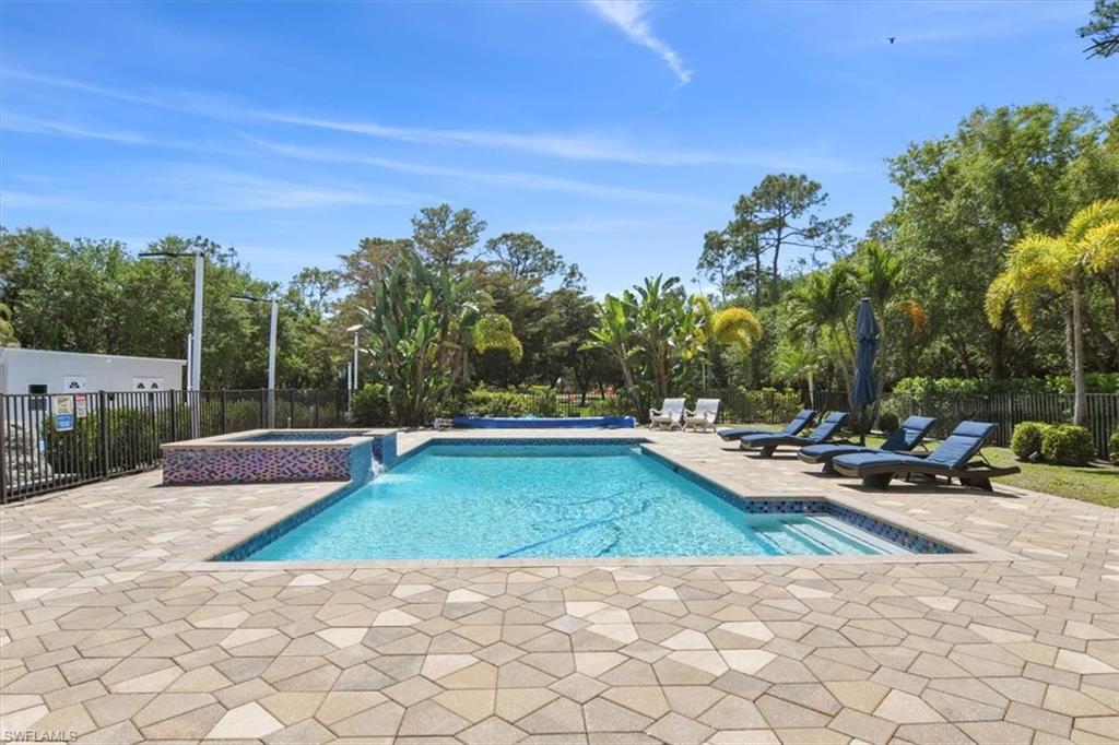 6941 Hunters Road Naples, FL 34109 - Photo 31 of 48 a view of a backyard