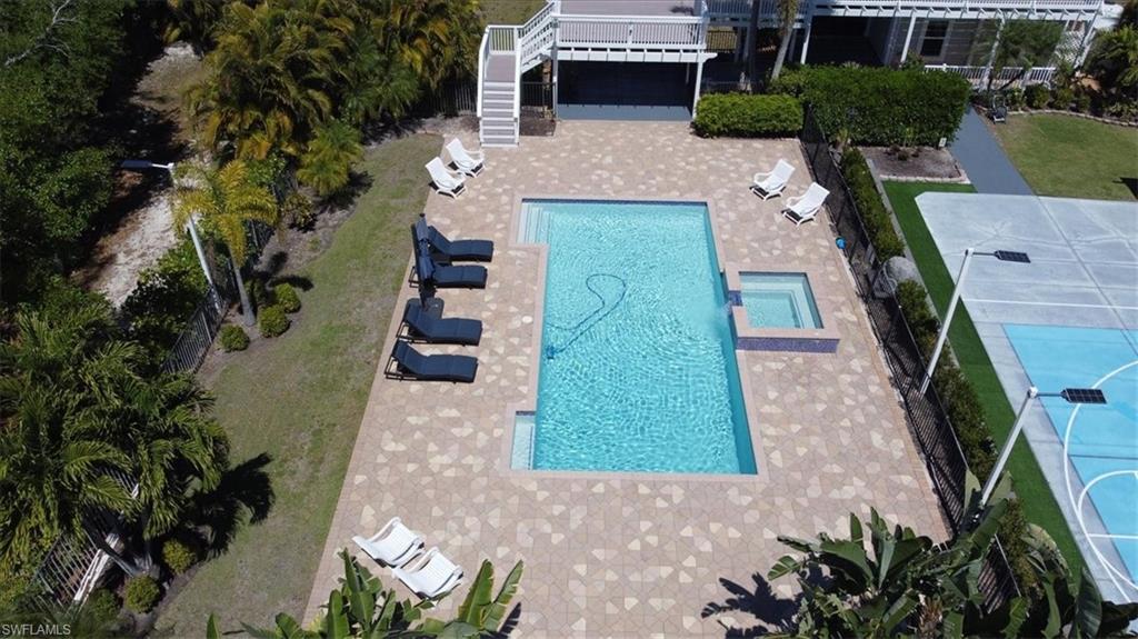 6941 Hunters Road Naples, FL 34109 - Photo 33 of 48 an aerial view of a house with outdoor space