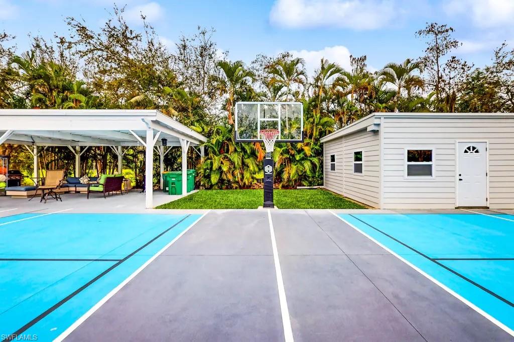 6941 Hunters Road Naples, FL 34109 - Photo 36 of 48 a view of outdoor space yard and patio