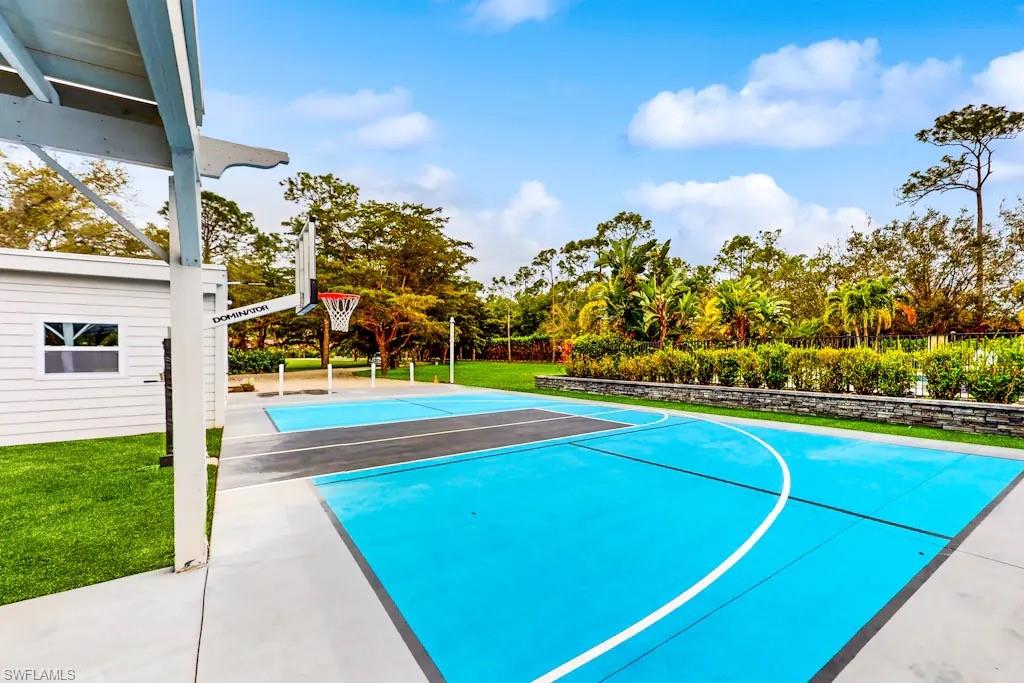 6941 Hunters Road Naples, FL 34109 - Photo 37 of 48 a view of a basket ball ground