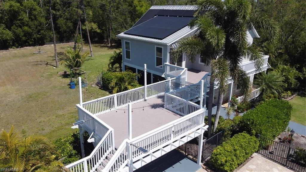 6941 Hunters Road Naples, FL 34109 - Photo 41 of 48 a view of house with outdoor space