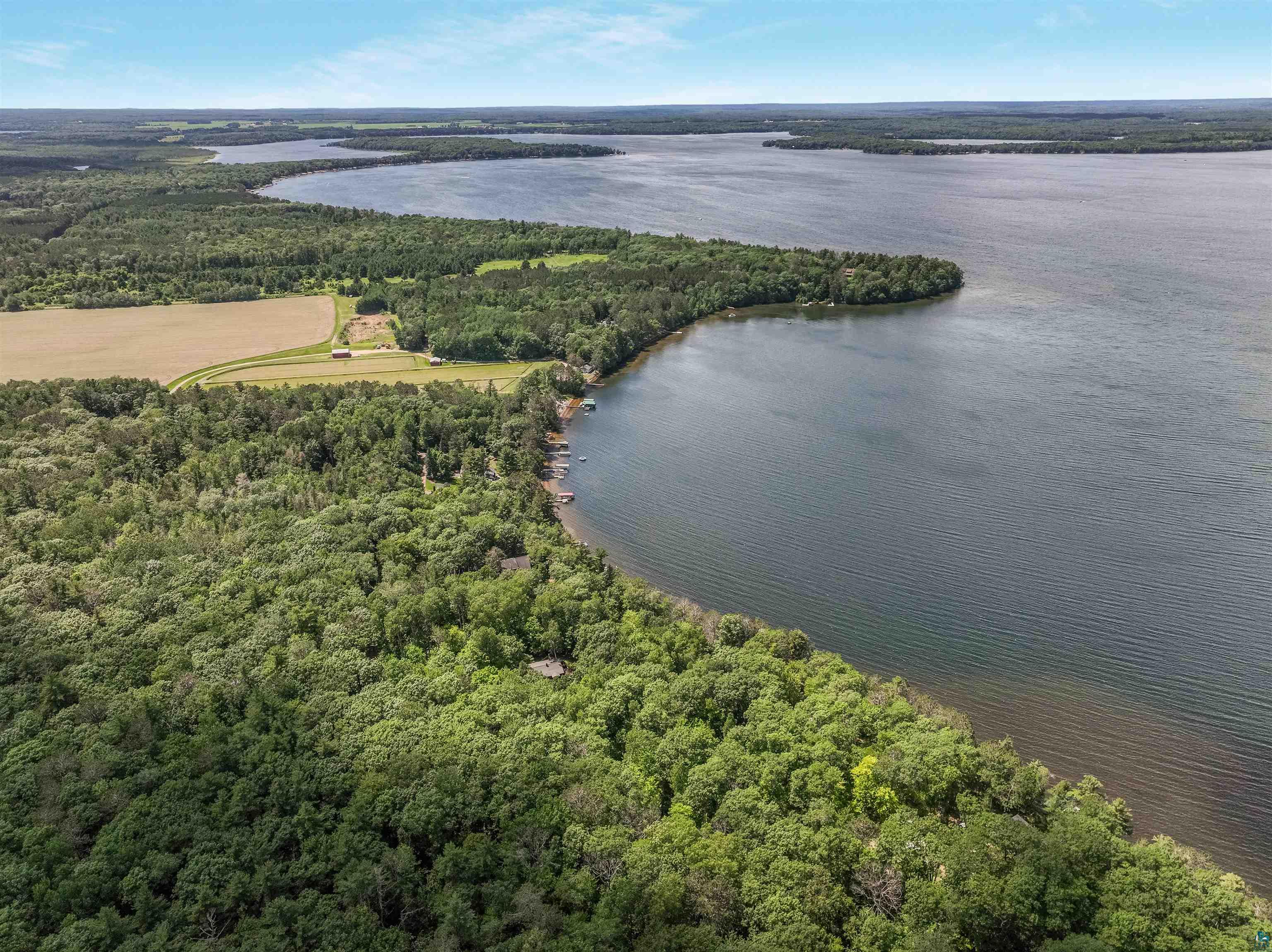 Lot 2 Thoroughfare Road Stone Lake, WI 54876 - Photo 6 of 13 Bird's eye view of a nearby body of water and a forest