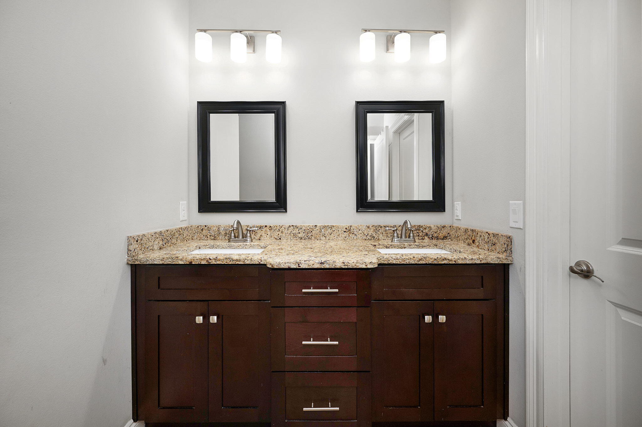 9018 Timber Lane Navarre, FL 32566 - Photo 15 of 39 a bathroom with a granite countertop sink and a mirror