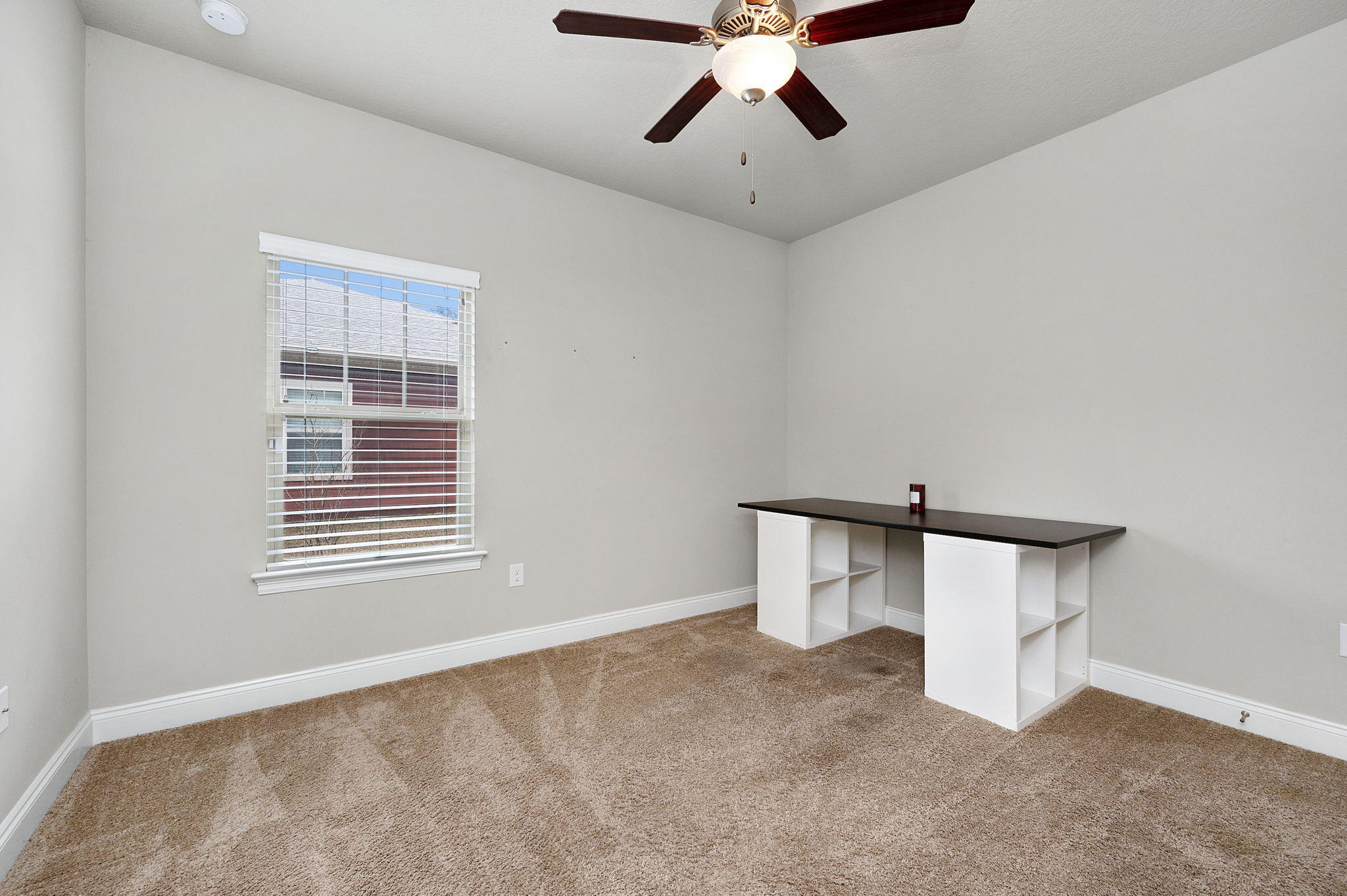 9018 Timber Lane Navarre, FL 32566 - Photo 21 of 39 a view of an empty room with a window
