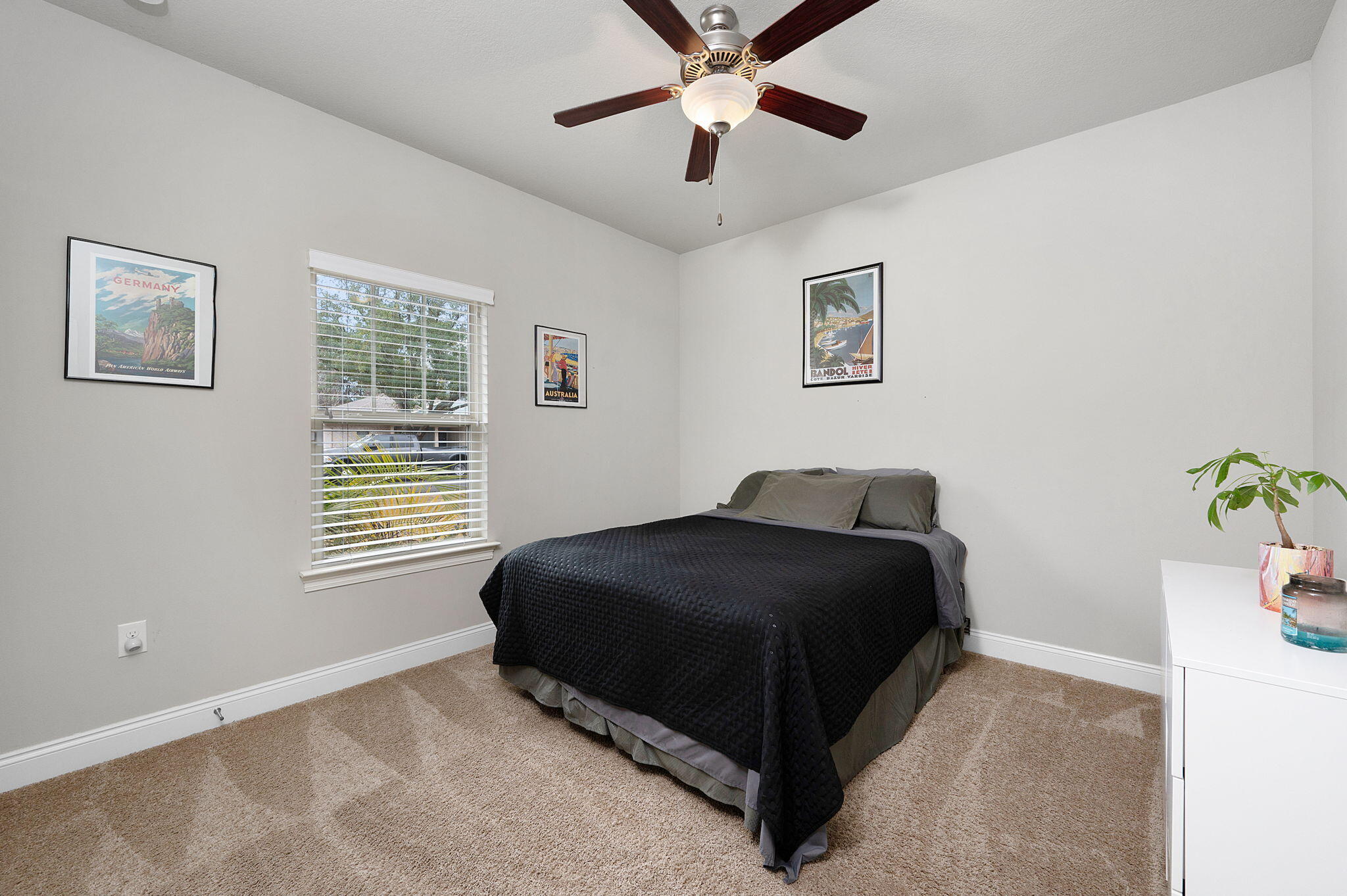 9018 Timber Lane Navarre, FL 32566 - Photo 27 of 39 a bedroom with a bed and window