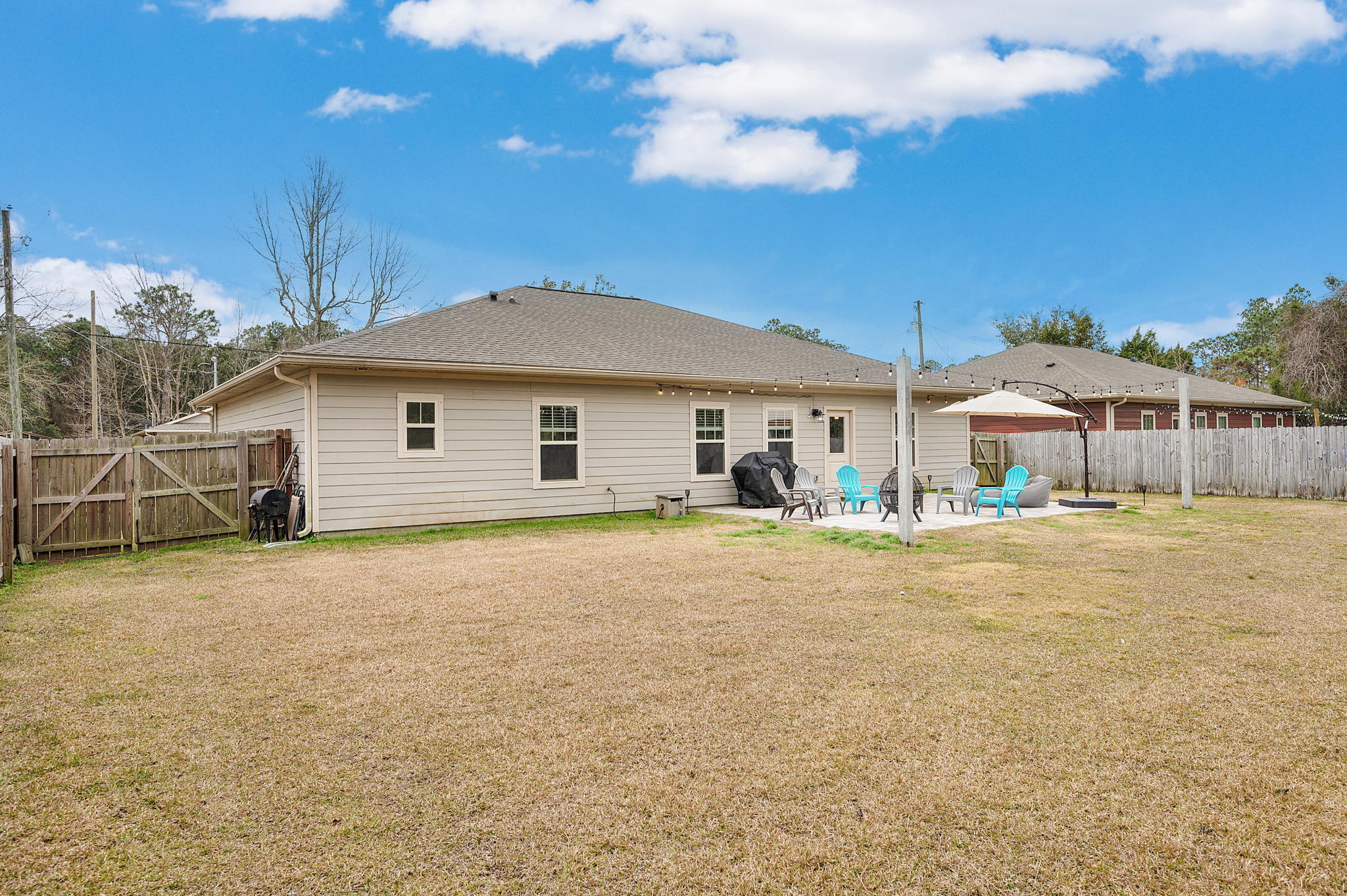 9018 Timber Lane Navarre, FL 32566 - Photo 33 of 39 a house view with a outdoor space