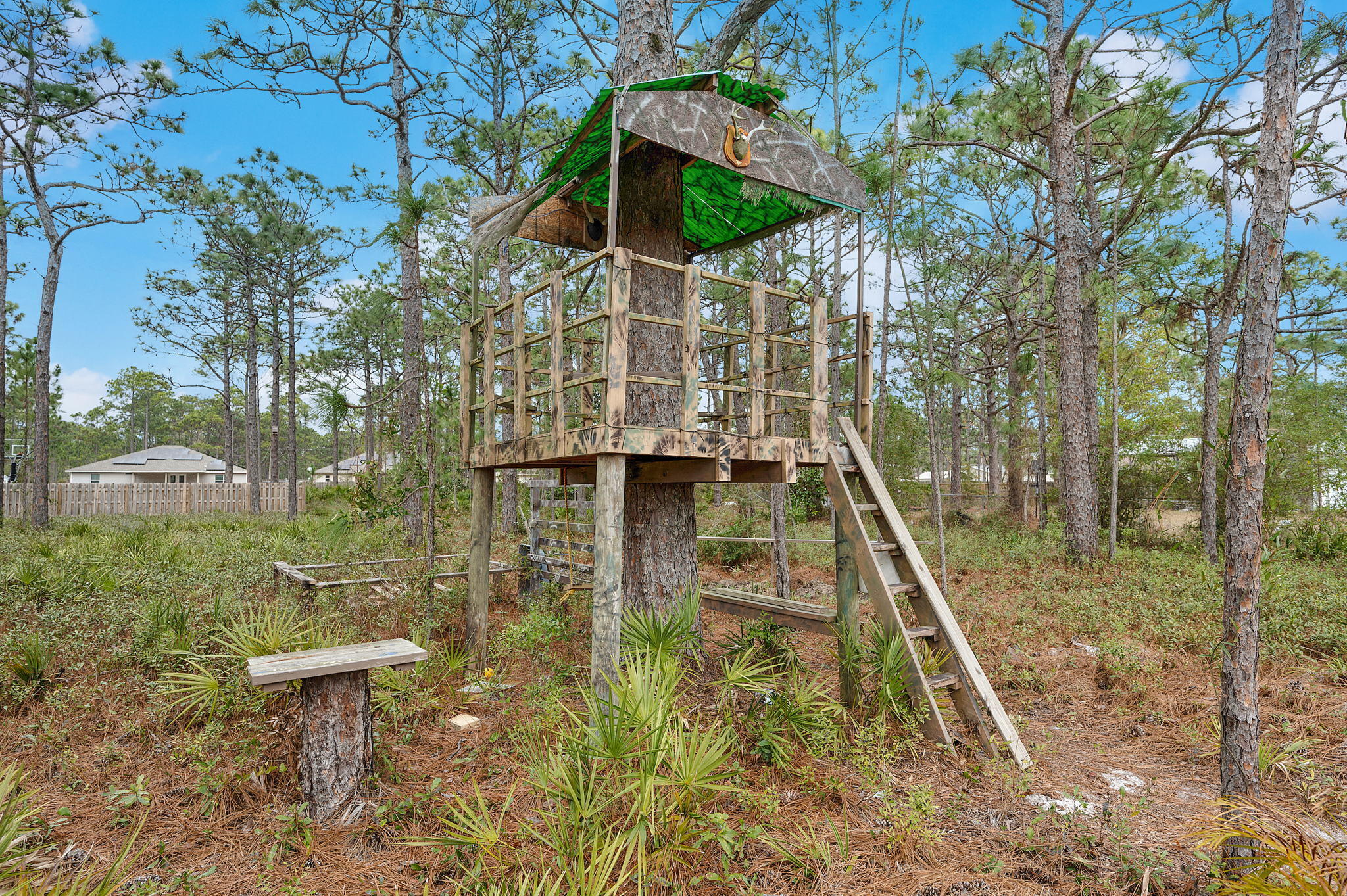 9018 Timber Lane Navarre, FL 32566 - Photo 36 of 39 a view of a garden with a slide