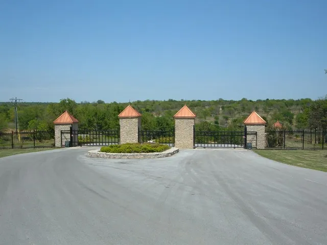 a view of a house with a street