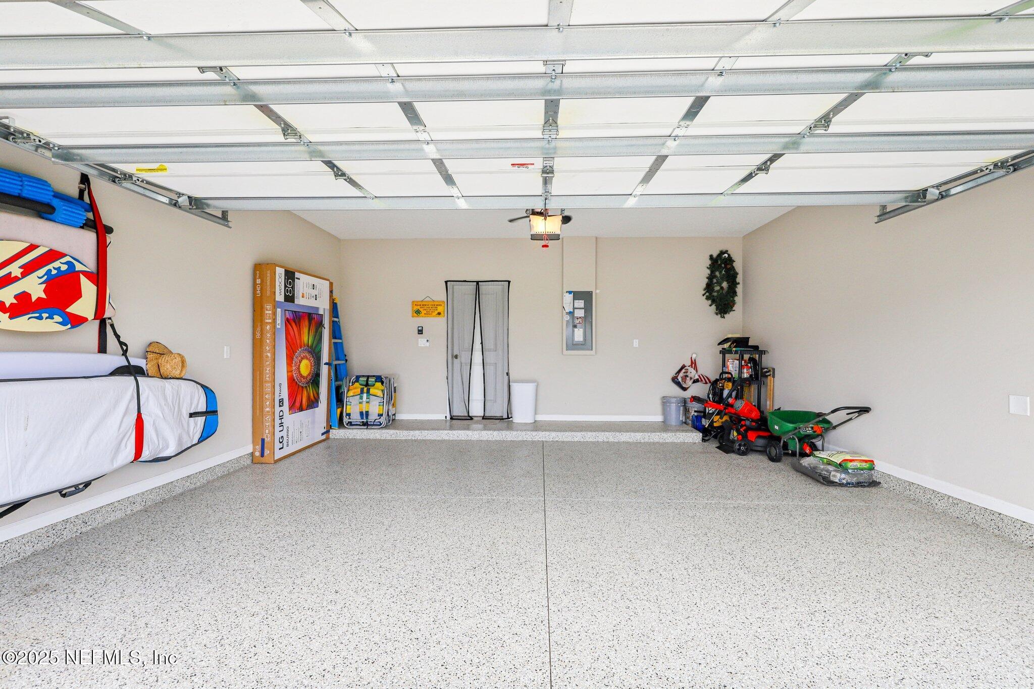 456 Stargaze Lane St. Augustine, FL 32095 - Photo 30 of 40 a view of a room with gym equipment