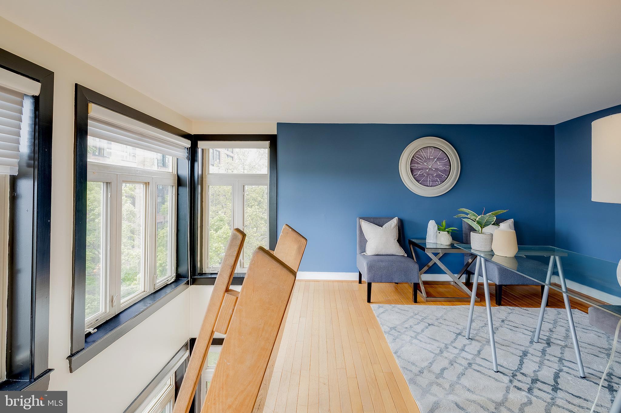 2363 Champlain Street Northwest, Unit 20 Washington, DC 20009 - Photo 15 of 29 a view of a livingroom with furniture and a window