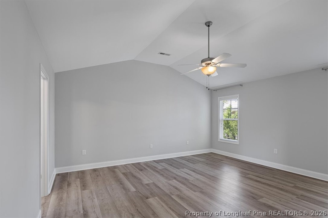 134 Huzzas Circle Cameron, NC 28326 - Photo 17 of 31 a view of room with window and hardwood floor
