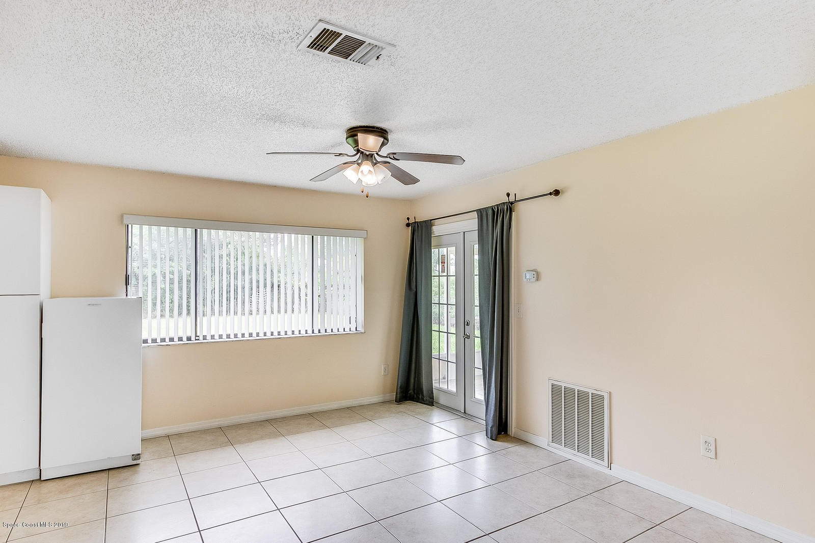 639 Furth Road Northwest Palm Bay, FL 32907 - Photo 14 of 22 a view of an empty room with a window