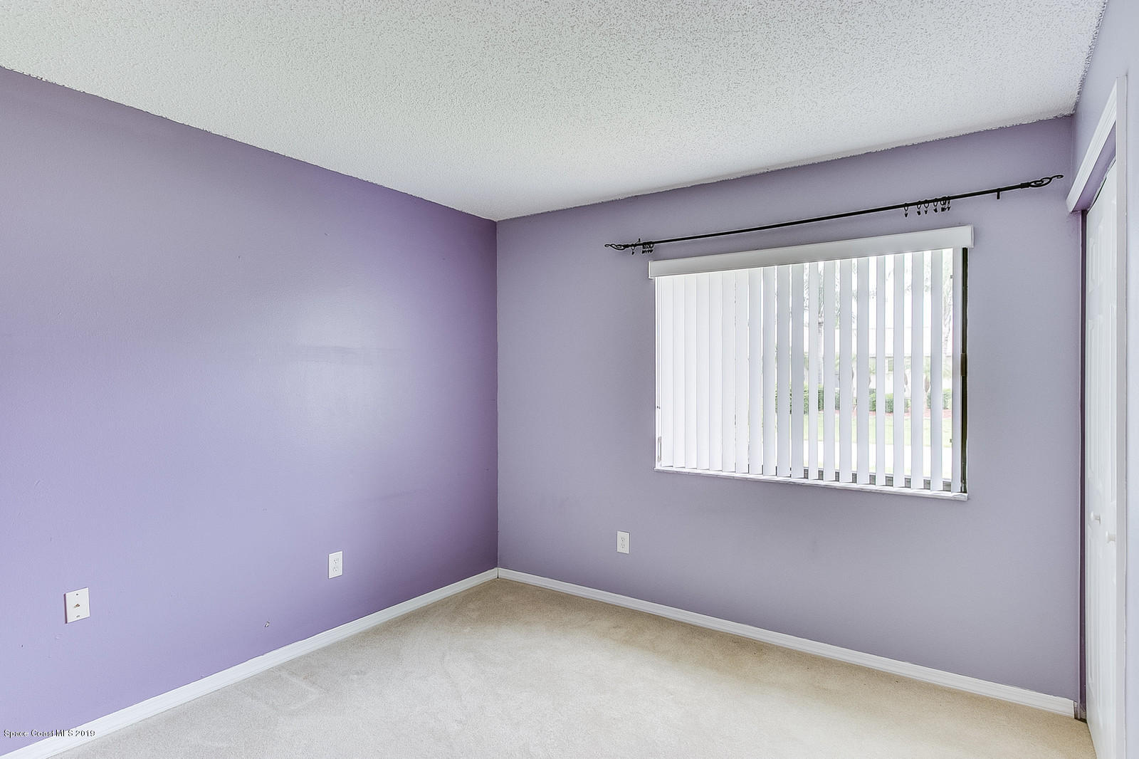 639 Furth Road Northwest Palm Bay, FL 32907 - Photo 16 of 22 an empty room with a window