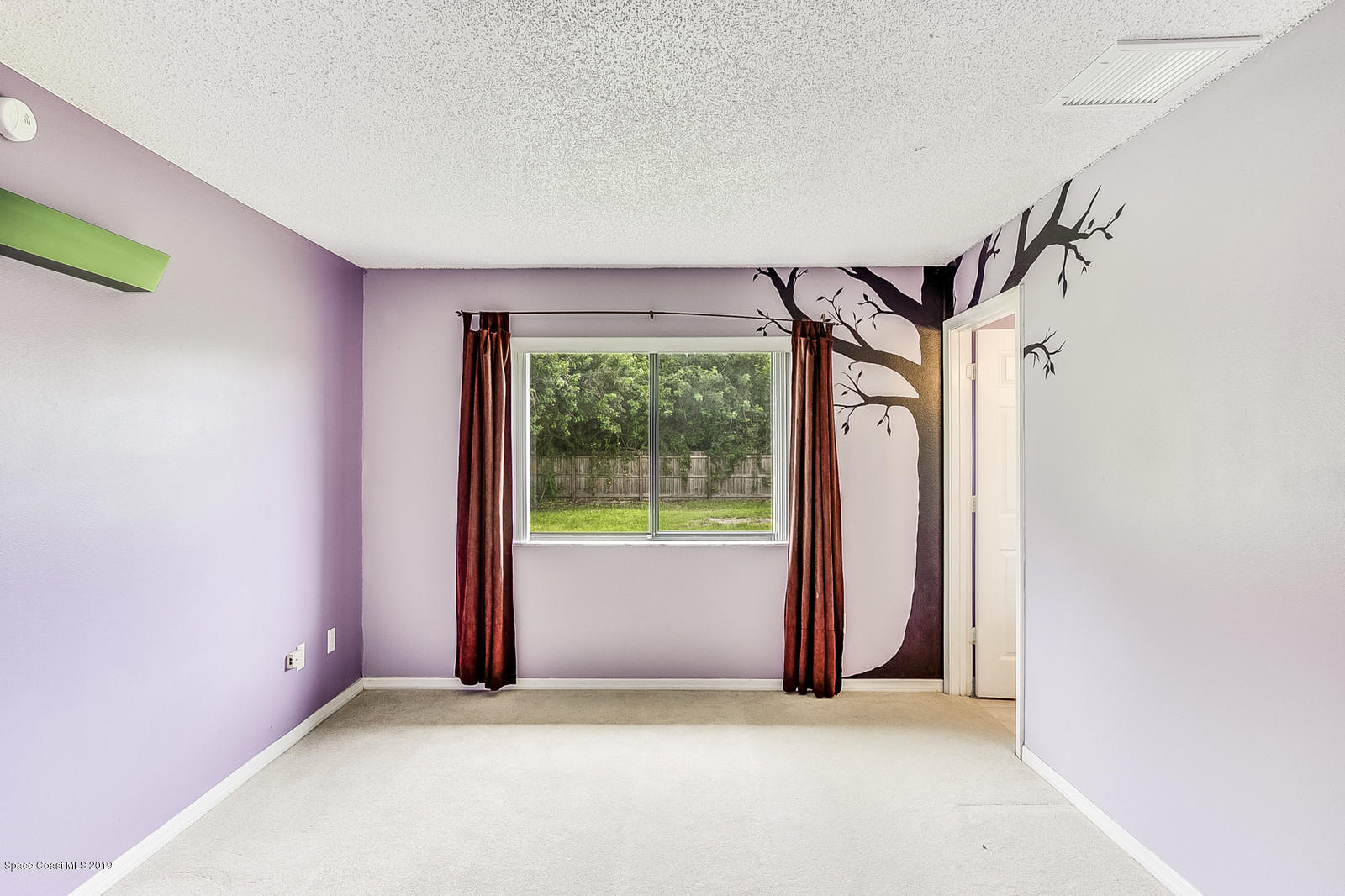 639 Furth Road Northwest Palm Bay, FL 32907 - Photo 19 of 22 a view of empty room with floor to ceiling window