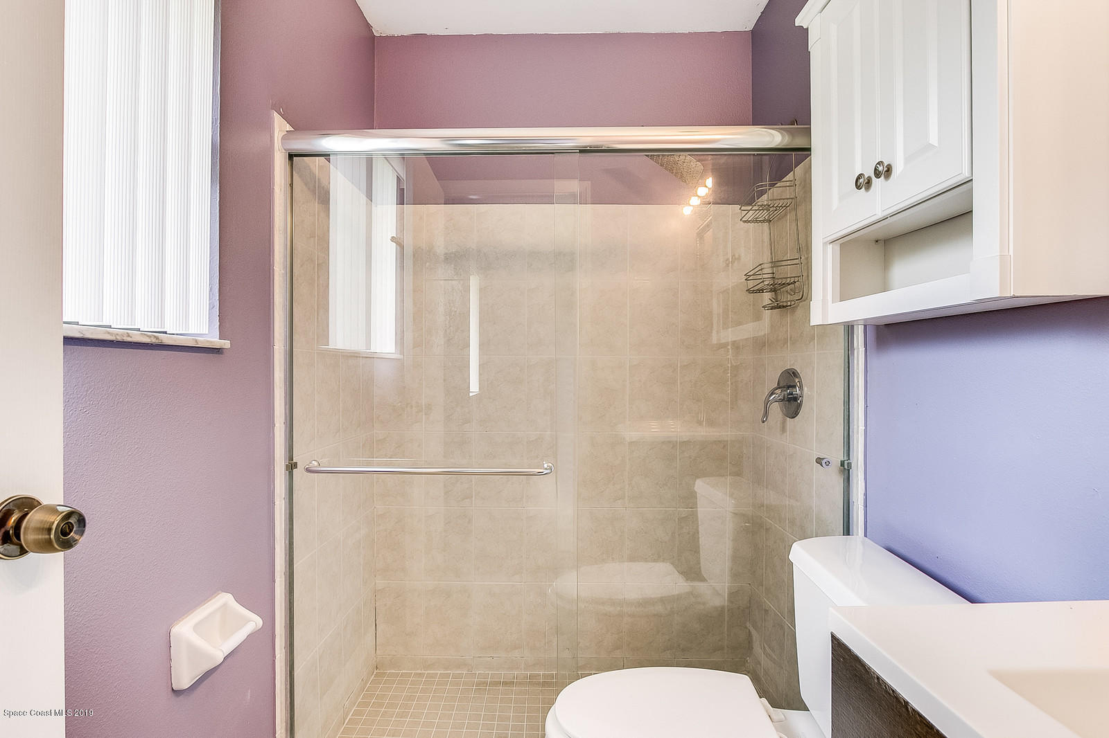 639 Furth Road Northwest Palm Bay, FL 32907 - Photo 20 of 22 a bathroom with a shower a toilet and a sink