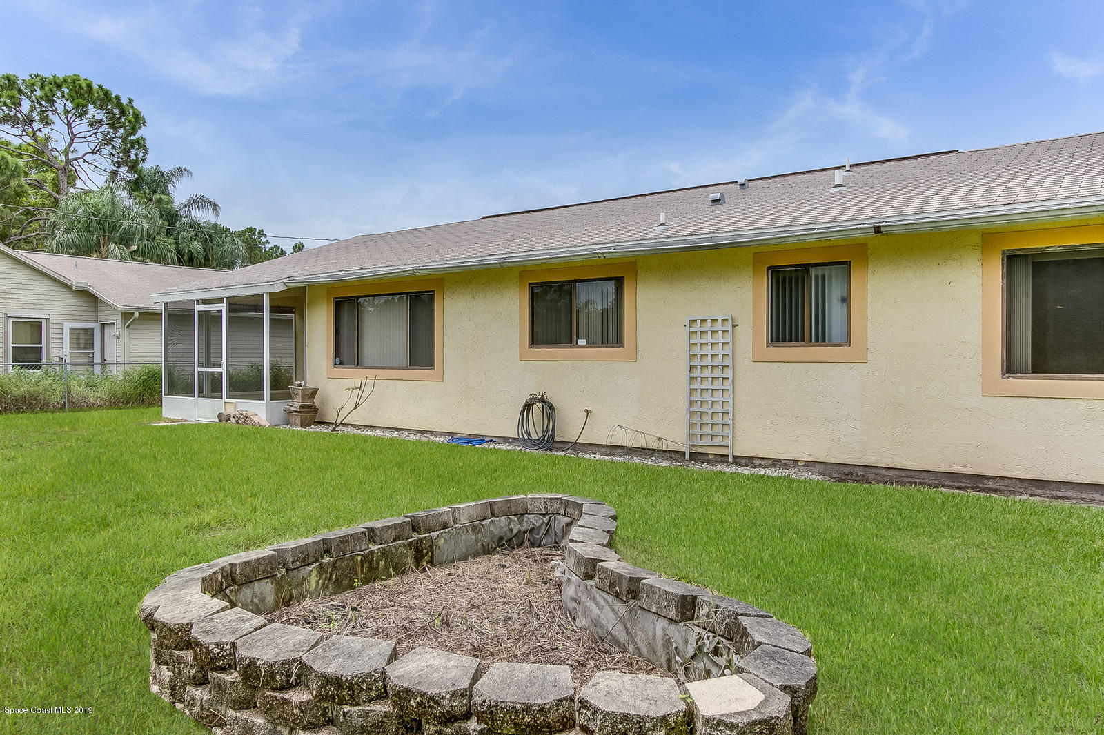 639 Furth Road Northwest Palm Bay, FL 32907 - Photo 5 of 22 a view of outdoor space yard and swimming pool