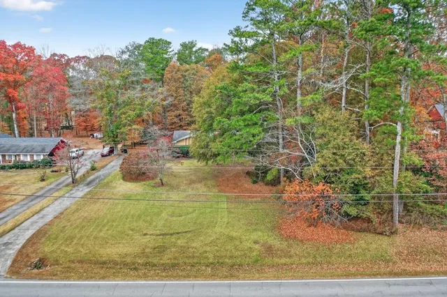 a view of swimming pool from a lake view