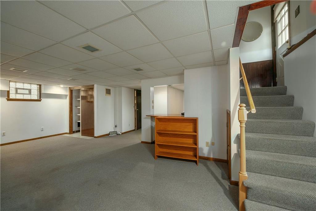 210 Cook Road Belle Vernon, PA 15012 - Photo 15 of 15 a view of room with stairs and a couch