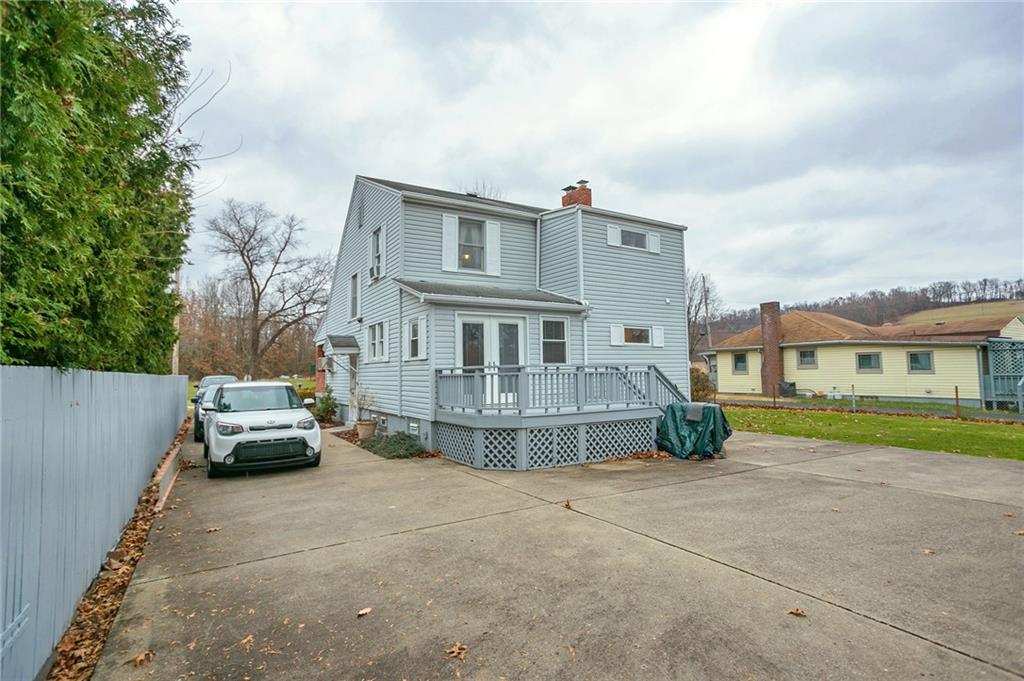 210 Cook Road Belle Vernon, PA 15012 - Photo 2 of 15 a view of a car in front of house