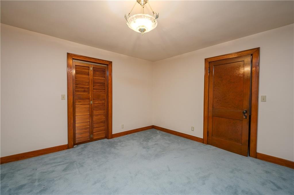 210 Cook Road Belle Vernon, PA 15012 - Photo 5 of 15 an empty room with windows and closet