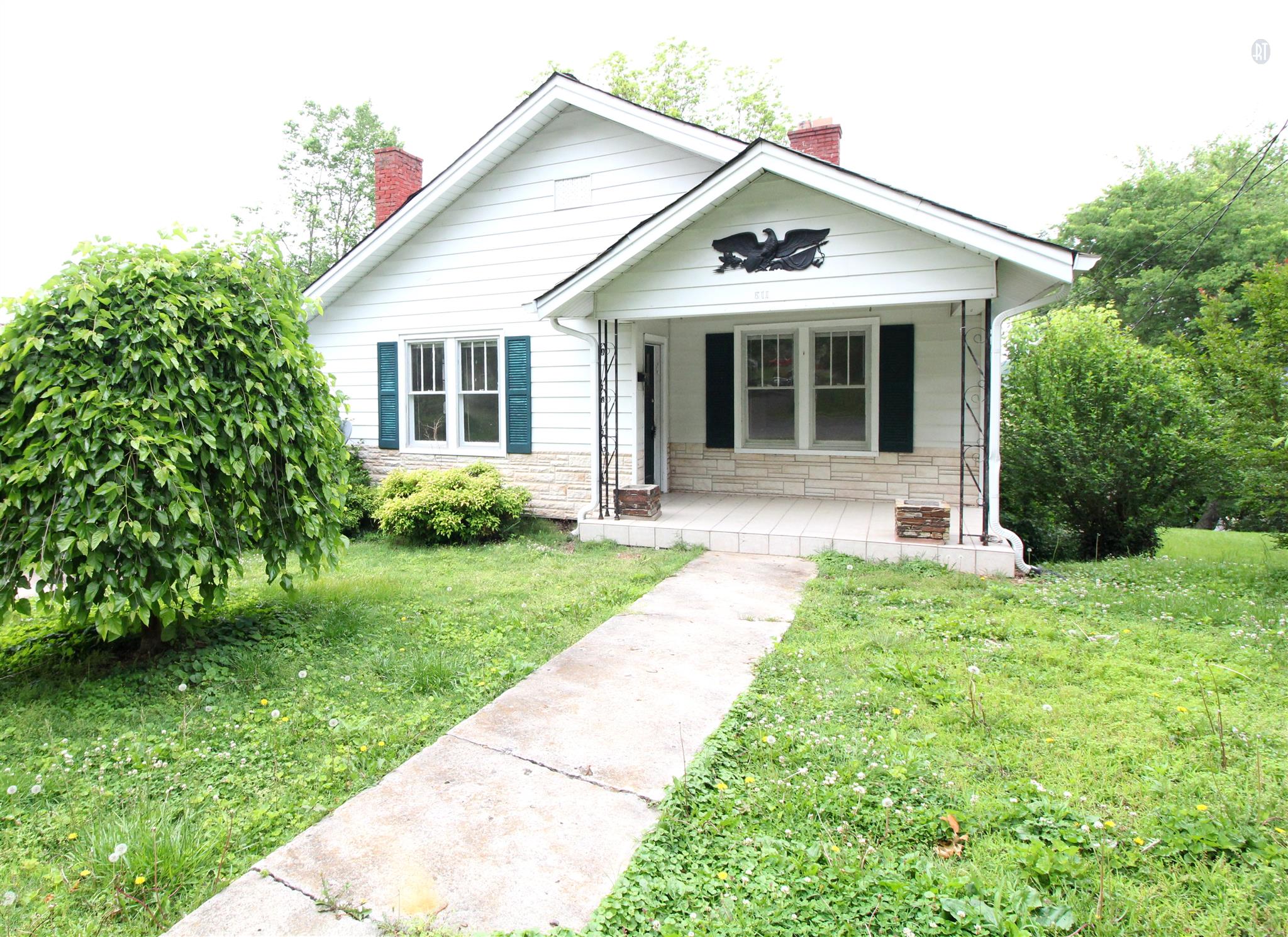 Charming home with a great front porch and yard. 