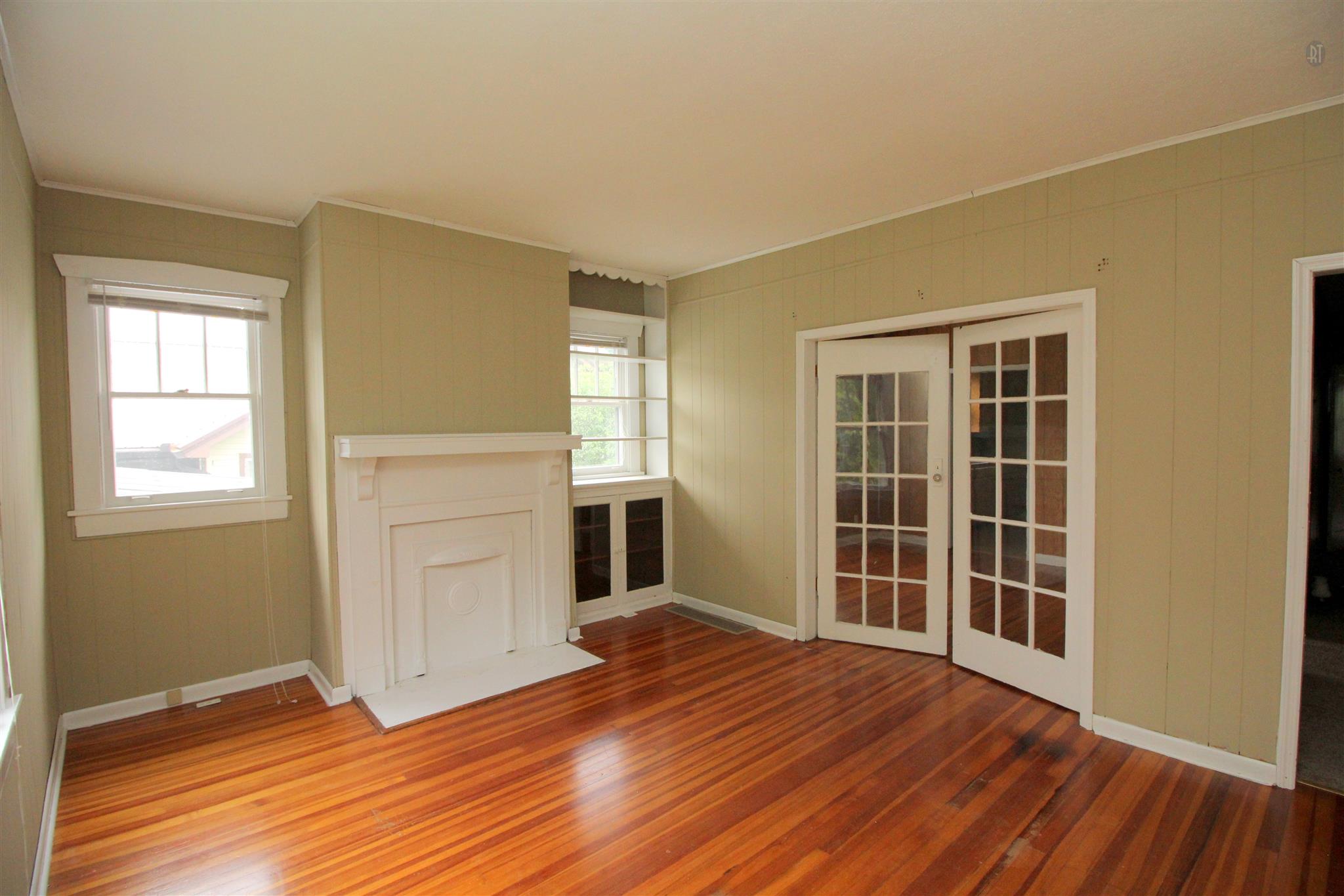 511 3rd Avenue West Springfield, TN 37172 - Photo 2 of 14 Beautiful hardwood floors and historical charm the moment you walk in the front door.