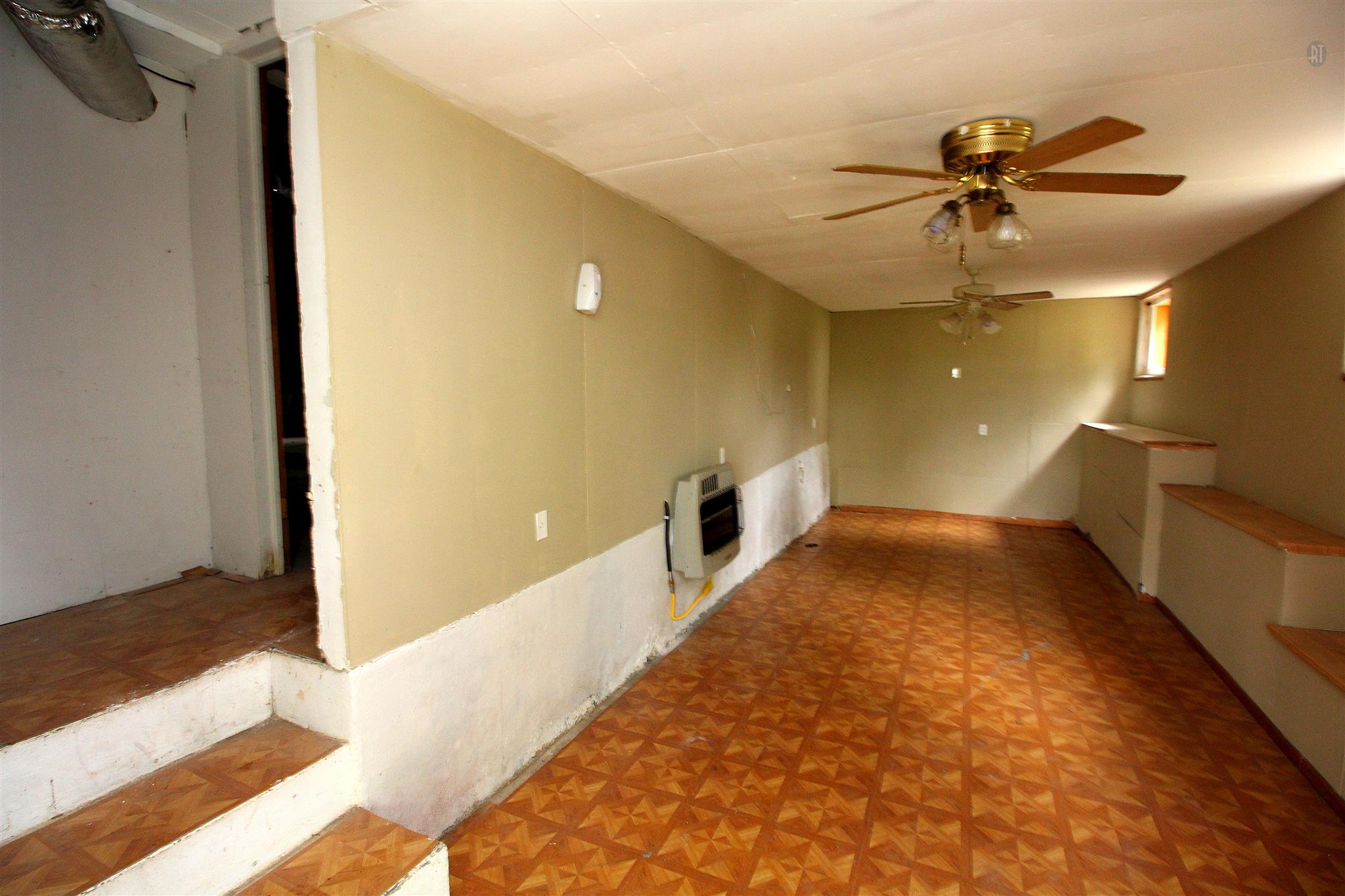 511 3rd Avenue West Springfield, TN 37172 - Photo 13 of 14 Basement recreation or hobby room. Lots of space for band practice or storing supplies for your hobby.