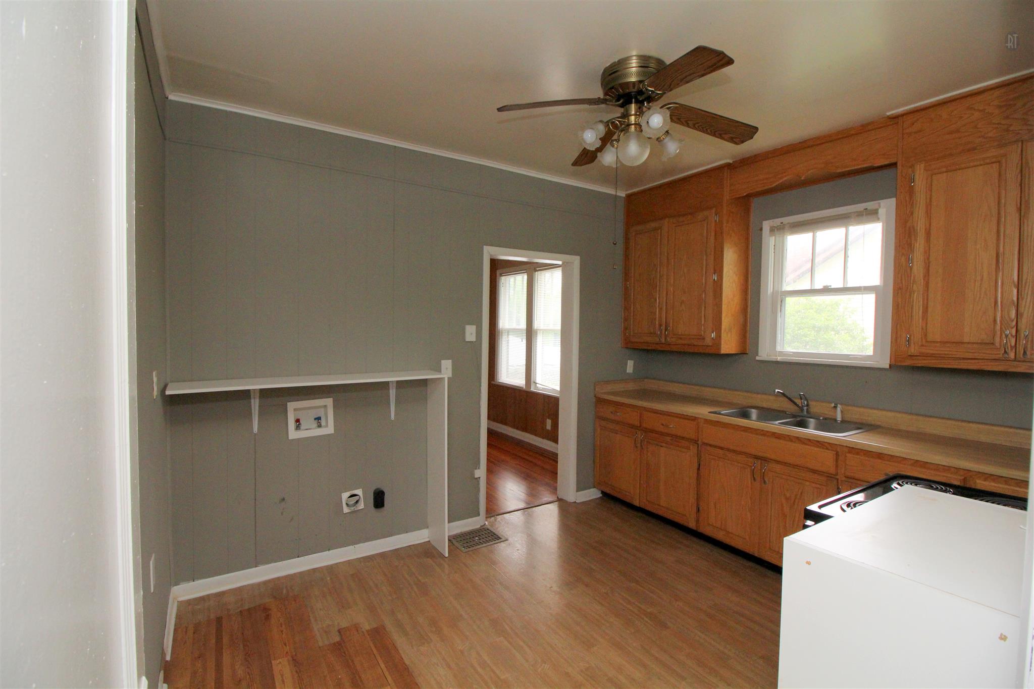 511 3rd Avenue West Springfield, TN 37172 - Photo 6 of 14 Kitchen has hook ups for a washer and dryer.